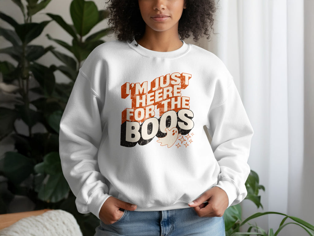 White sweatshirt with distressed text "I'm just here for the boos" and a ghost.