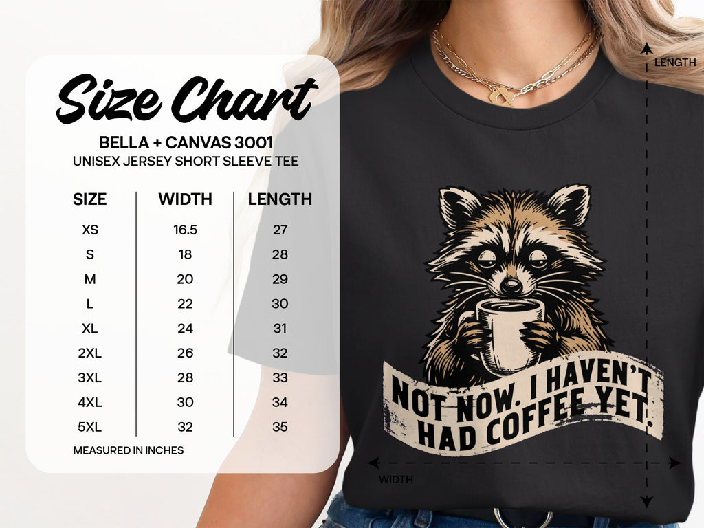 Bella + Canvas 3001 unisex t-shirt size chart with raccoon graphic and text "Not Now. I Haven't Had Coffee Yet."