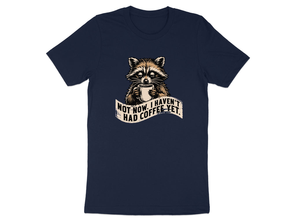 Navy t-shirt with raccoon holding coffee mug and text "Not now. I haven't had coffee yet."