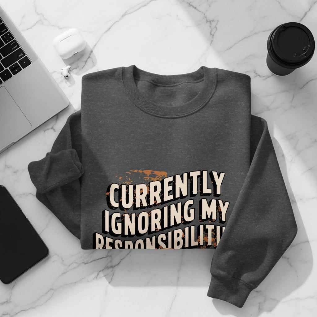Dark grey sweatshirt with "Currently Ignoring My Responsibility" text.