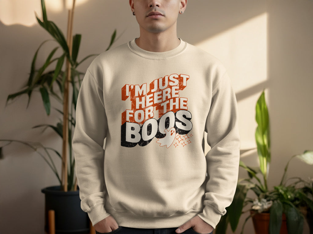 Cream sweatshirt with "I'm Just Heere For The Boos" text and ghost graphic.