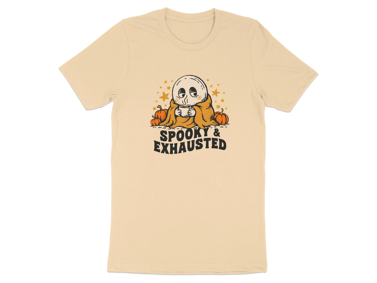 T-shirt with a ghost drinking coffee surrounded by pumpkins and stars, text reads "SPOOKY & EXHAUSTED".