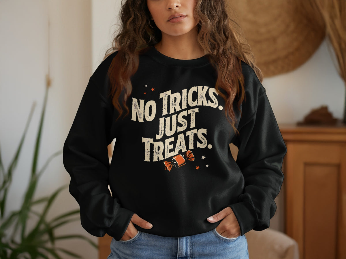 Black crewneck sweatshirt with "No Tricks, Just Treats" text and candy graphic.