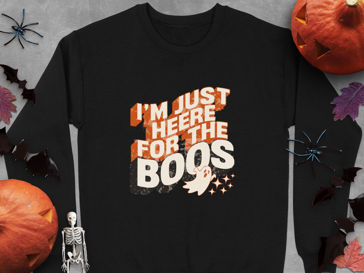 Black sweatshirt with "I'M JUST HEERE FOR THE BOOS" Halloween graphic and ghost.