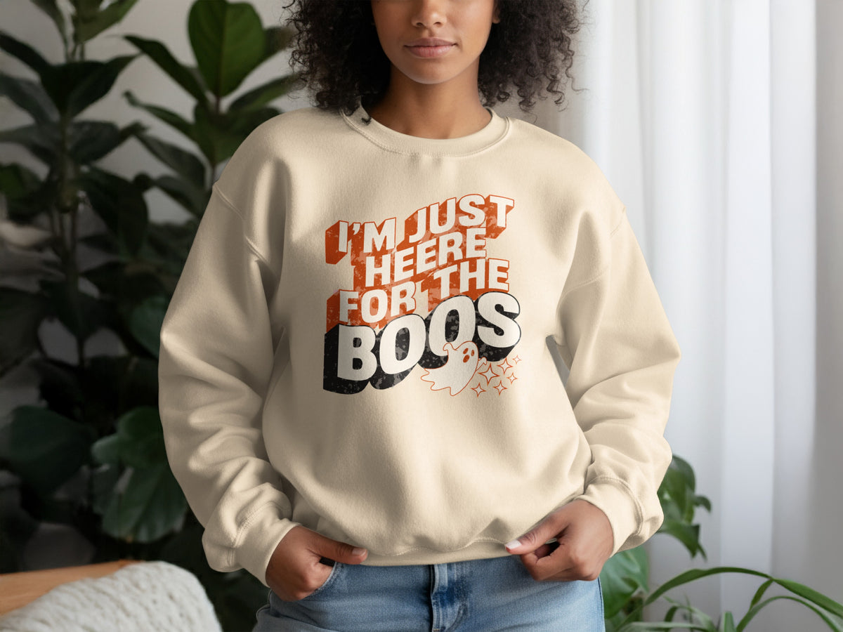 Cream sweatshirt with "I'm Just Heere For The Boos" and ghost graphic.