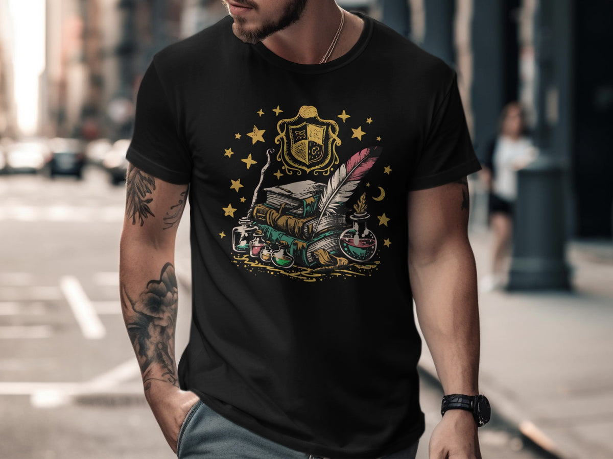 Black t-shirt featuring a vintage crest, books, potion bottles, and a quill.