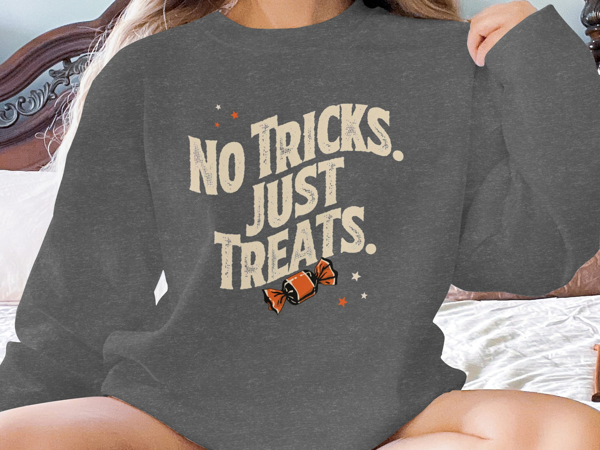 Gray sweatshirt with "No Tricks Just Treats" and candy graphic.
