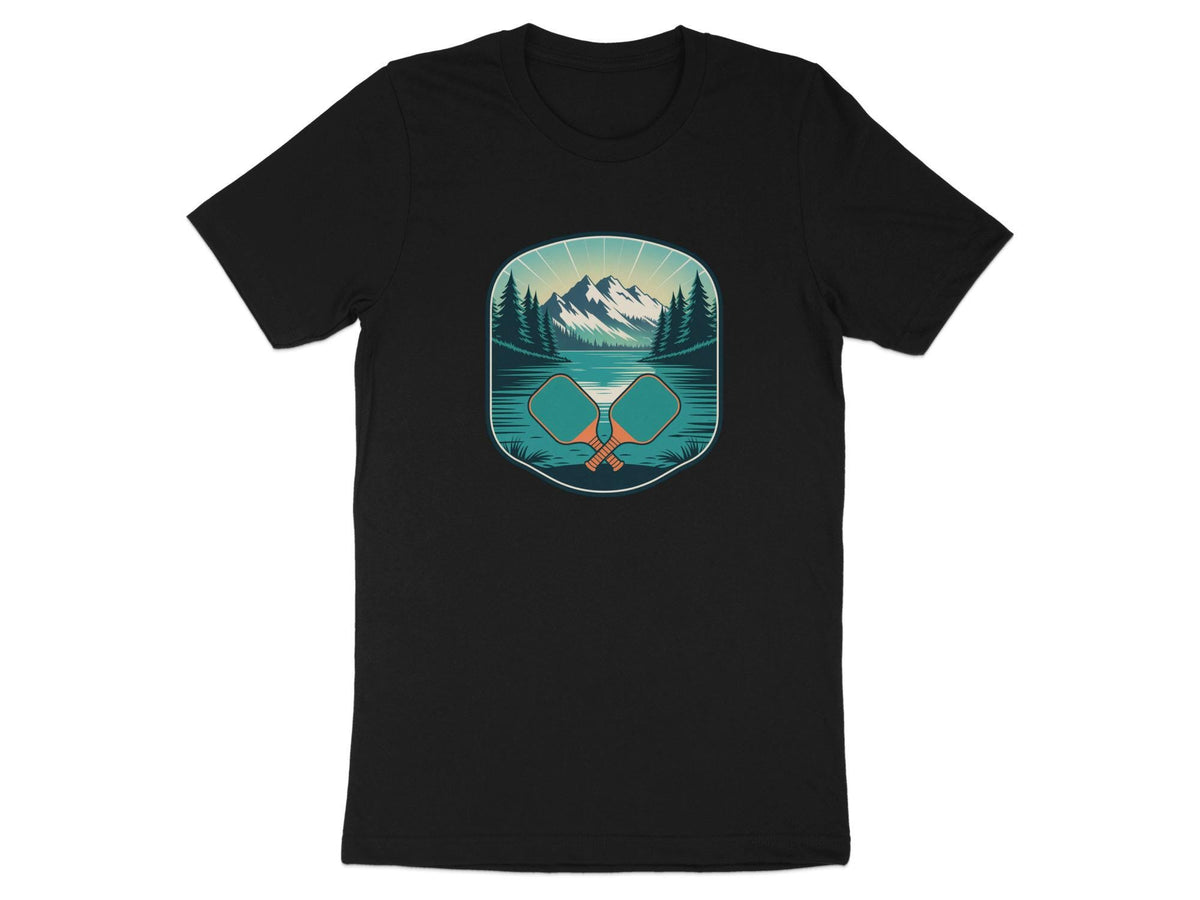 Black t-shirt with oval graphic of crossed pickleball paddles before a lake and mountains.